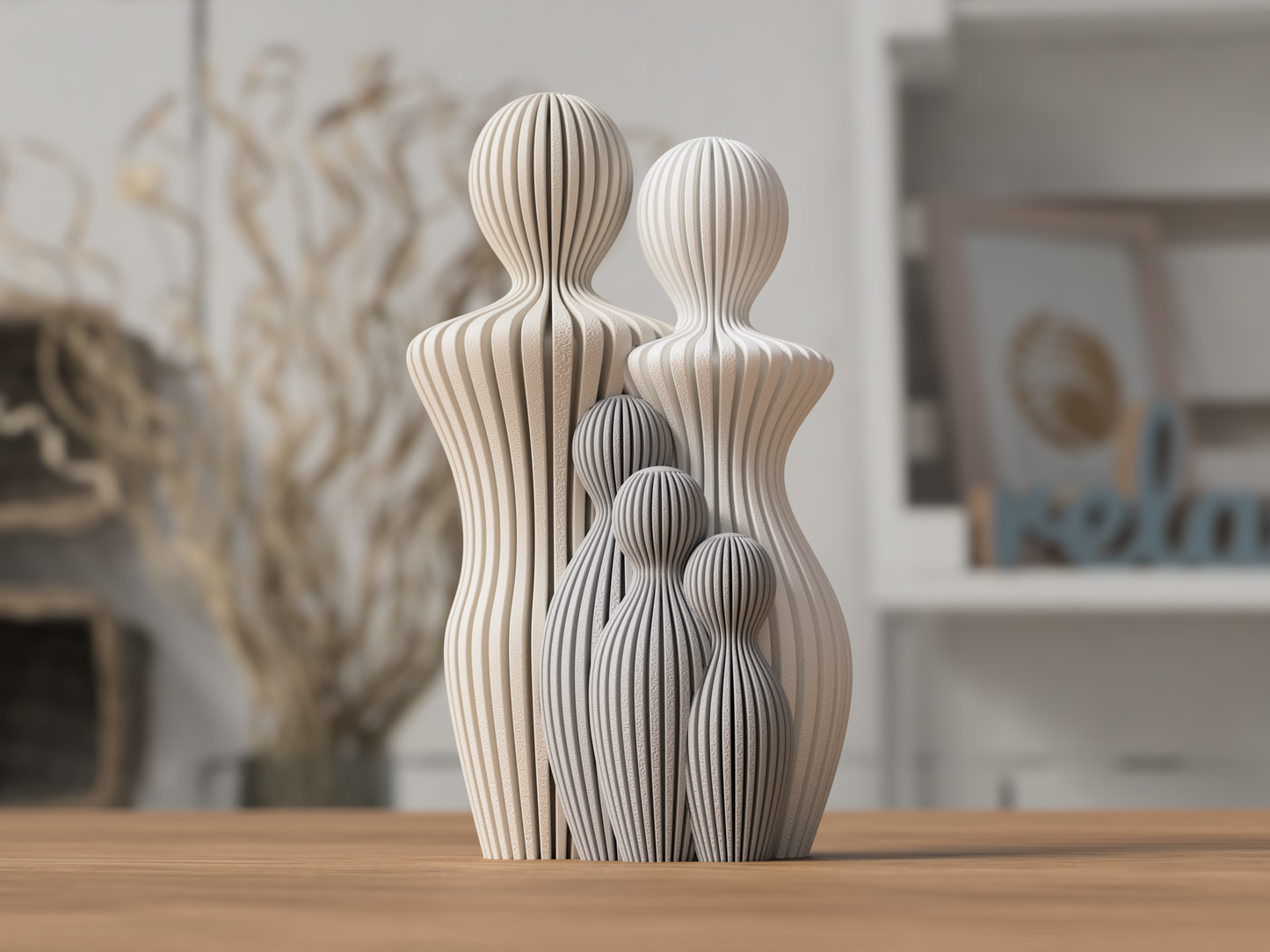 Familjeskulptur med 3 barn
