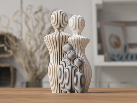 Familjeskulptur med 3 barn
