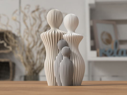 Familjeskulptur med 2 barn