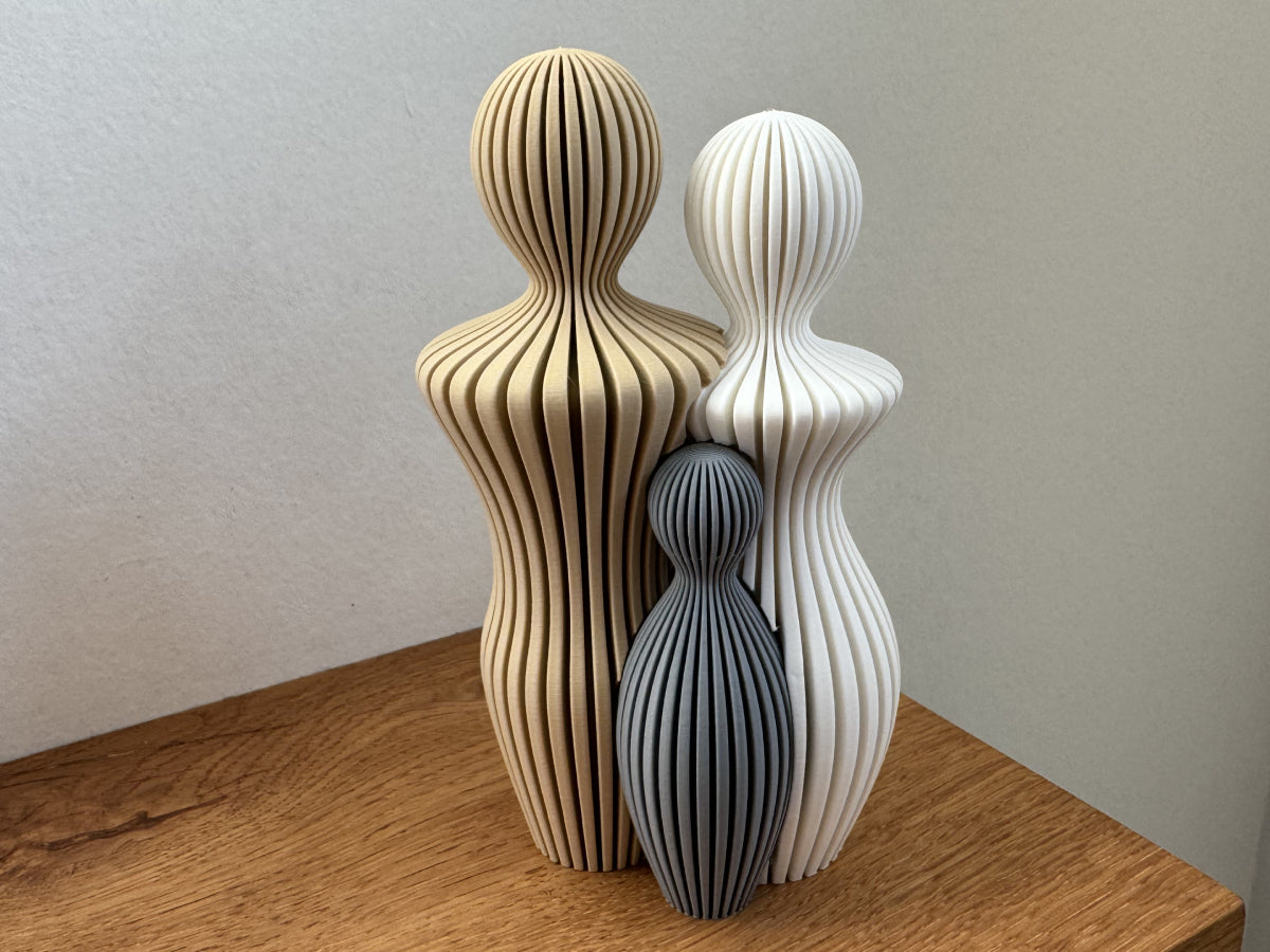 Familjeskulptur med 1 barn