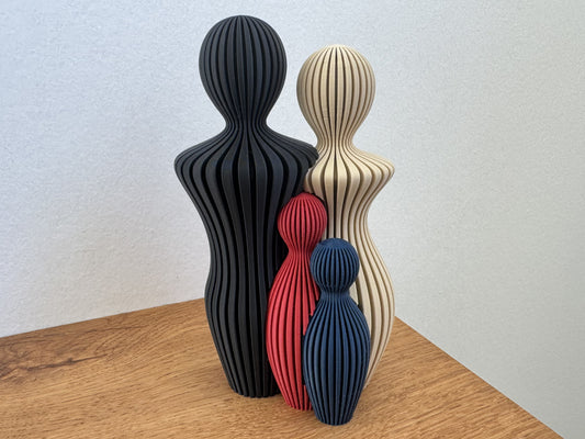 Familjeskulptur med 2 barn