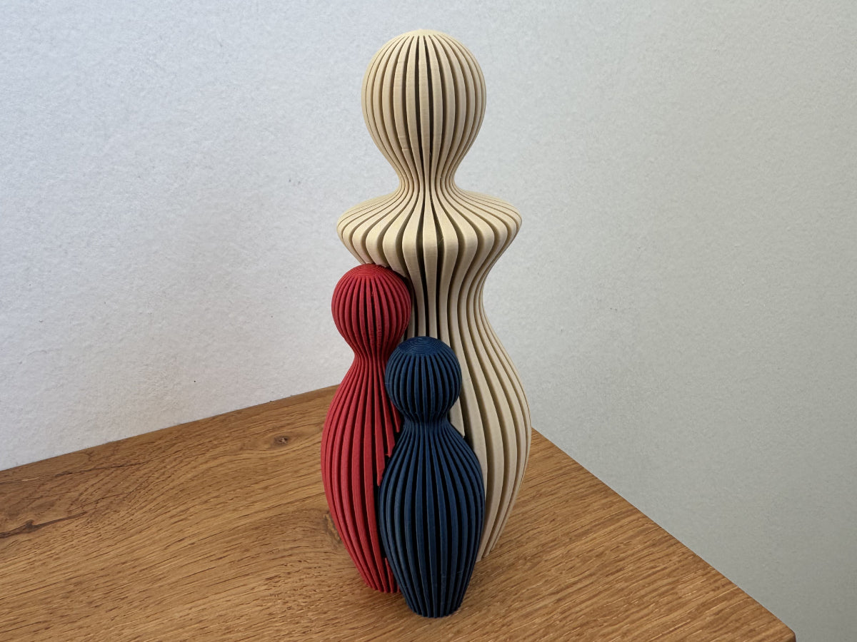 Mors dag-skulptur med 2 barn